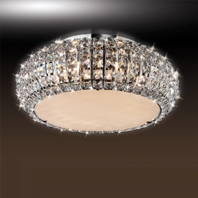 Люстра круглая Odeon Light 1606/6 хром Crista Люстра круглая Odeon Light 1606/6 хром CristaПотолочные<br>Дополнительно рекомендуем посмотреть другие хрустальные люстры и светильники из данной серии. Модель - люстры Odeon Light 1606/6 в хроме Crista замечательно впишется в задуманный Вами интерьер зала, гостиной или спальни. Купите хрустальную люстру уже сегодня и Вы поймете превосходство светильников перед другими направлениями освещения. Основное превосходство хрусталя - это отражение и преломление света во всем пространстве, а отсутствие абажуров не съест получаемый световой поток от горящих ламп!<br><br>Установка на натяжной потолок: Ограничено<br>S освещ. до, м2: 13<br>Крепление: Планка<br>Тип лампы: галогенная / LED-светодиодная<br>Тип цоколя: G9<br>Количество ламп: 5<br>Ширина, мм: 400<br>MAX мощность ламп, Вт: 40<br>Высота, мм: 145<br>Цвет арматуры: серебристый