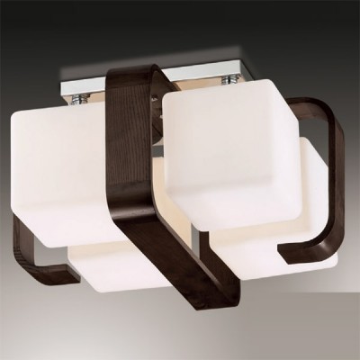 Люстра Odeon Light 2199/4C хром Via Люстра Odeon Light 2199/4C хром ViaПотолочные<br>Интерьер порой просто требует внесения оригинальных нот в собственное пространство, но не желает переходить на излишние диковинки. Здесь незаменимым помощником станет, к примеру, люстра Odeon Light 2199/4C в восточном стиле. Геометрия её деталей, с одной стороны, достаточно проста и лаконична, но, с другой, сама конструкция является переплетением нескольких тактичных и гармоничных между собой форм. Также интересно сочетание хромированной конструкции, деталей из тёмного дерева и ламп в виде кубов с мягкими краями. Это действительно стильно и оригинально, когда речь идёт о лаконичной сложности элементов. Вам просто гарантирован яркий свет и уникальный дизайн от люстры Odeon Light 2199/4C!<br><br>Установка на натяжной потолок: Ограничено<br>S освещ. до, м2: 16<br>Крепление: планка<br>Тип лампы: накаливания / энергосбережения / LED-светодиодная<br>Тип цоколя: E27<br>Количество ламп: 4<br>MAX мощность ламп, Вт: 60<br>Диаметр, мм мм: 310<br>Высота, мм: 140<br>Цвет арматуры: серебристый