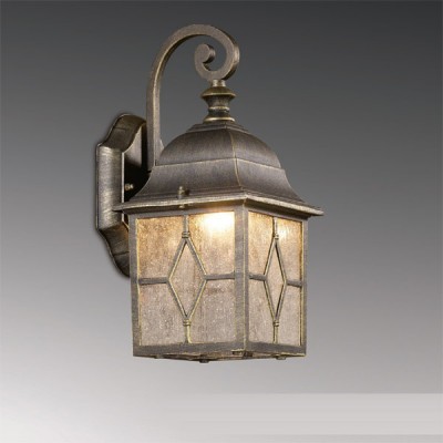 Светильник настенный Odeon light 2309/1W бронза Lartua Светильник настенный Odeon light 2309/1W бронза LartuaНастенные<br>Уличный светильник Odeon light 2309/1W обеспечит Ваш экстерьер насыщенным сиянием и украсит пространство собственной эстетикой. Перед Вами достойное европейского качества творение итальянских мастеров. Надёжная бронзовая конструкция искусно дополнена прочными стеклянными вставками, что делает светильник безупречным спутником экстерьерных площадок и их благородным украшением. Лаконичная форма фонаря настенного уличного светильника позволяет использовать его сольно или в комплексных вариациях. Любая придомовая площадка, наполненная соответствующим сиянием, будет отличаться явным преимуществом от затемнённых территорий, благодаря ярким лучам Odeon light 2308/1W!<br><br>S освещ. до, м2: до 4<br>Тип лампы: накаливания / энергосбережения / LED-светодиодная<br>Тип цоколя: E27<br>Количество ламп: 1<br>Ширина, мм: 151<br>MAX мощность ламп, Вт: 60<br>Расстояние от стены, мм: 208<br>Высота, мм: 322<br>Цвет арматуры: бронзовый
