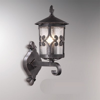 Светильник настенный Odeon light 2310/1W тем. коричневый Bukle Светильник настенный Odeon light 2310/1W тем. коричневый BukleНастенные<br>Обеспечение качественного уличного освещения – важная задача для владельцев коттеджей. Компания «Светодом» предлагает современные светильники, которые порадуют Вас отличным исполнением. В нашем каталоге представлена продукция известных производителей, пользующихся популярностью благодаря высокому качеству выпускаемых товаров. Уличный светильник Odeon light 2310/1W не просто обеспечит качественное освещение, но и станет украшением Вашего участка. Модель выполнена из современных материалов и имеет влагозащитный корпус, благодаря которому ей не страшны осадки. Купить уличный светильник Odeon light 2310/1W , представленный в нашем каталоге, можно с помощью онлайн-формы для заказа. Чтобы задать имеющиеся вопросы, звоните нам по указанным телефонам. Мы доставим Ваш заказ не только в Москву и Екатеринбург, но и другие города.<br><br>S освещ. до, м2: до 4<br>Тип товара: Уличный светильник<br>Скидка, %: 40<br>Тип лампы: накаливания / энергосбережения / LED-светодиодная<br>Тип цоколя: E27<br>Количество ламп: 1<br>Ширина, мм: 155<br>MAX мощность ламп, Вт: 60<br>Расстояние от стены, мм: 221<br>Высота, мм: 353<br>Цвет арматуры: коричневый