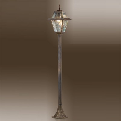 Светильник Odeon light 2318/1F бронза Outer Светильник Odeon light 2318/1F бронза OuterОдиночные фонари<br>Вы задумались над грамотным оформлением придомовой площадки? Тогда пора обратить внимание на экстерьерное освещение от безупречных итальянских производителей. К примеру, особенно лаконичен и презентабелен уличный фонарь Odeon light 2318/1F бронзового мерцания. Перед Вами действительно высокое европейское качество, призванное служить долгие годы на самой прочной основе. Удлинённый силуэт конструкции фонаря завершается художественно стилизованным оформлением стеклянной основы. Это интересный и благородный дизайнерский подход к экстерьерному делу. Чтобы на Вашей улице царил насыщенный и высококачественный свет, доверьтесь восхитительному творению Odeon light 2318/1F!<br><br>S освещ. до, м2: до 4<br>Тип лампы: накаливания / энергосбережения / LED-светодиодная<br>Тип цоколя: E27<br>Количество ламп: 1<br>MAX мощность ламп, Вт: 60<br>Диаметр, мм мм: 195<br>Высота, мм: 1250<br>Цвет арматуры: бронзовый