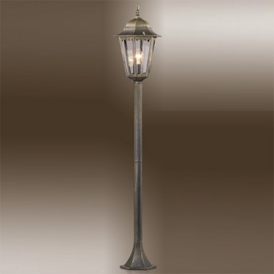 Светильник Odeon light 2322/1F бронза Lano Светильник Odeon light 2322/1F бронза LanoОдиночные фонари<br>Не забывайте, что уличное освещение требует повышенного внимания в вопросе подбора подходящих изделий, которые к тому же чаще всего используются в составе цельной композиции. Представляем Вашему вниманию достойный похвалы фонарный экземпляр Odeon light 2322/1F: лаконичный, практичный, благородного эстетического оформления. Это своеобразная классика экстерьерного освещения, где сочетаются удлинённый силуэт, правильные пропорции и отсутствие лишнего декора. Конструкция Odeon light 2322/1F представлена лаконичным размером 150 см и завершается стилизованным фонарём со стеклянными окнами ярких лучей от закреплённой внутри лампы. Украсьте свою придомовую площадку лучшим светом!<br><br>S освещ. до, м2: до 4<br>Тип лампы: накаливания / энергосбережения / LED-светодиодная<br>Тип цоколя: E27<br>Количество ламп: 1<br>MAX мощность ламп, Вт: 60<br>Диаметр, мм мм: 231<br>Высота, мм: 1210<br>Цвет арматуры: бронзовый