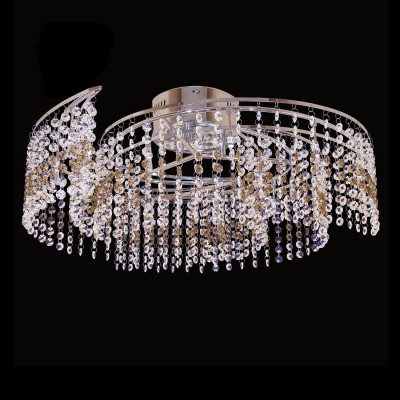 Люстра Mw light 244017812 Каскад Люстра Mw light 244017812 КаскадПотолочные<br>Описание модели 244017812: Люстра из коллекции «Каскад» - это сочетание манящего блеска и оригинальных форм. Металлическое основание цвета хрома окутано лабиринтом из декоративных хрустальных подвесок. Переплетающиеся ярусы создают объемный свет, а грациозно ниспадающие капли хрусталя контрастных оттенков образуют мерцающие переливы, которые наполнят обстановку комнаты волшебным светом.<br><br>Установка на натяжной потолок: Ограничено<br>S освещ. до, м2: 12<br>Рекомендуемые колбы ламп: пальчиковая<br>Крепление: Планка<br>Тип товара: Люстра<br>Цветовая t, К: 2800-3200 K<br>Тип лампы: галогенная / LED-светодиодная<br>Тип цоколя: G4<br>Количество ламп: 12<br>MAX мощность ламп, Вт: 20<br>Диаметр, мм мм: 610<br>Высота, мм: 200<br>Поверхность арматуры: глянцевый<br>Цвет арматуры: серебристый<br>Общая мощность, Вт: 240