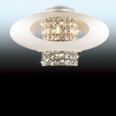 Люстра Odeon light 2604/4C Люстра Odeon light 2604/4CПотолочные<br>Элегантность, роскошь, тщательная обработка каждой детали – основные черты, характеризующие потолочный светильник Odeon light 2604/4С! Оригинальная конструкция прекрасно сочетается с плафоном, выполненным из хрусталя, и заставляет вновь и вновь поднимать к себе восхищенный взгляд. Луч, попадая на множество прозрачных граней, создает уникальное, «искрящееся» освещение на площади до 11 кв.м. Этот светильник станет настоящим украшением любой комнаты, а совместно с настенными бра и настольной лампой из этой же серии, он сделает интерьер «цельным», гармоничным и уютным.<br><br>Установка на натяжной потолок: Да<br>S освещ. до, м2: 11<br>Крепление: Планка<br>Тип цоколя: G9<br>Цвет арматуры: серебристый<br>Количество ламп: 4<br>Диаметр, мм мм: 450<br>Высота, мм: 240<br>Оттенок (цвет): белый<br>MAX мощность ламп, Вт: 40