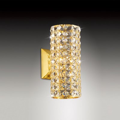 Светильник Odeon light 2608/1W Светильник Odeon light 2608/1WХрустальные<br>Яркий, запоминающийся настенный светильник Odeon light 2608/1W внесет в Ваш интерьер роскошный и «благородный» облик, станет его «изюминкой» и украшением! Плафон, выполненный из множества хрустальных вставок, гармонично сочетается с «золотым» оттенком крепления и арматуры и создает уникальное, «искрящееся» освещение. Наиболее «выигрышно» он будет смотреться в комнате, где в цветовой гамме преобладают «теплые» тона («золотистые», «молочные», «бежевые» и т.п). Рекомендуем Вам использовать бра в комплекте из нескольких экземпляров и люстрой из этой же серии, тогда интерьер будет выглядеть «законченным» и совершенным, как будто над ним поработал профессиональный дизайнер.<br><br>S освещ. до, м2: 3<br>Тип цоколя: G9<br>Количество ламп: 1<br>Ширина, мм: 120<br>MAX мощность ламп, Вт: 40<br>Высота, мм: 260<br>Цвет арматуры: золотой