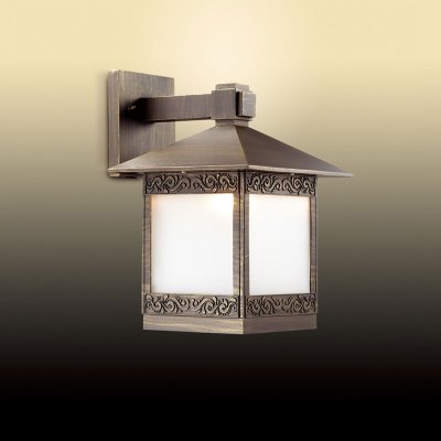Светильник уличный Odeon light 2644/1W Светильник уличный Odeon light 2644/1WНастенные<br>Обеспечение качественного уличного освещения – важная задача для владельцев коттеджей. Компания «Светодом» предлагает современные светильники, которые порадуют Вас отличным исполнением. В нашем каталоге представлена продукция известных производителей, пользующихся популярностью благодаря высокому качеству выпускаемых товаров. Уличный светильник Odeon light 2644/1W не просто обеспечит качественное освещение, но и станет украшением Вашего участка. Модель выполнена из современных материалов и имеет влагозащитный корпус, благодаря которому ей не страшны осадки. Купить уличный светильник Odeon light 2644/1W , представленный в нашем каталоге, можно с помощью онлайн-формы для заказа. Чтобы задать имеющиеся вопросы, звоните нам по указанным телефонам. Мы доставим Ваш заказ не только в Москву и Екатеринбург, но и другие города.<br><br>S освещ. до, м2: до 4<br>Тип цоколя: E27<br>Количество ламп: 1<br>Ширина, мм: 226<br>MAX мощность ламп, Вт: 60<br>Высота, мм: 330<br>Цвет арматуры: коричневый