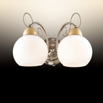 Светильник Odeon light 2658/2W Светильник Odeon light 2658/2WМодерн<br>Настенное бра Odeon light 2658/2W пропитано лаконичным благородством в безупречном стиле модерн. Несмотря на то, что изделие имеет простую геометрию и понятные формы, оно дополнено и отдельными оригинальными деталями. Аккуратные шарообразные плафоны у основания накрыты купольными элементами из натурального дерева, что придаёт модное наполнение всей конструкции прекрасного серебристого мерцания. Интересным штрихом являются витиеватые изгибы отдельных деталей настенного бра Odeon light 2658/2W, которые придают изделию повышенную утончённость и мягкий модерновый стиль. Такой итальянский шедевр станет истинным украшением Вашего современного интерьера, достойного насыщенного сияния!<br><br>S освещ. до, м2: 8<br>Тип цоколя: E27<br>Количество ламп: 2<br>Ширина, мм: 320<br>MAX мощность ламп, Вт: 60<br>Высота, мм: 220<br>Оттенок (цвет): белый<br>Цвет арматуры: серый