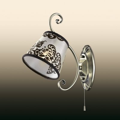 Настенный светильник odeon light 2687/1W PARI Настенный светильник odeon light 2687/1W PARIРустика<br><br><br>S освещ. до, м2: 4<br>Тип товара: Светильник настенный бра<br>Тип лампы: накаливания / энергосбережения / LED-светодиодная<br>Тип цоколя: E14<br>Количество ламп: 1<br>Ширина, мм: 150<br>MAX мощность ламп, Вт: 60<br>Расстояние от стены, мм: 290<br>Высота, мм: 300<br>Цвет арматуры: бронзовый