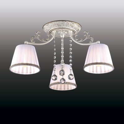 Люстра odeon light 2697/3C VEADO Люстра odeon light 2697/3C VEADOПотолочные<br>Вдохновенная рустика воплощена в потолочной люстре odeon light 2697/3C. Во-первых, перед Вами изделие высшего итальянского качества. Во-вторых, оно выполнено в лучших традициях европейской моды: стильной, изысканной и безупречной. При взоре на потолочную люстру odeon light 2697/3C возникает ощущение, что перед Вами истинное творение художников и скульпторов. В изделии прекрасно всё: начиная с цветового исполнения, заканчивая дизайном. Сочетание чистого белоснежного оттенка и золотистых вкраплений делает люстру odeon light 2697/3C стильной и благородной. Текстильные плафоны состоят из плотного и прозрачного материалов, гармонично дополняющих друг друга. Итальянский шедевр к тому же украшен хрустальными нитями. Так в едином творении воплощены итальянская грация, безупречный вкус и модные тенденции.<br><br>Установка на натяжной потолок: Да<br>S освещ. до, м2: 12<br>Крепление: Планка<br>Тип лампы: накаливания / энергосбережения / LED-светодиодная<br>Тип цоколя: E14<br>Количество ламп: 3<br>MAX мощность ламп, Вт: 60<br>Диаметр, мм мм: 540<br>Высота, мм: 260<br>Цвет арматуры: белый с золотистой патиной