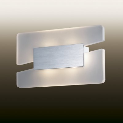 Настенный светильник odeon light 2721/6WL AMAFO Настенный светильник odeon light 2721/6WL AMAFOХай-тек<br><br><br>S освещ. до, м2: 0<br>Тип лампы: LED - светодиодная<br>Тип цоколя: LED<br>Количество ламп: 1<br>Ширина, мм: 260<br>MAX мощность ламп, Вт: 6<br>Расстояние от стены, мм: 60<br>Высота, мм: 156<br>Цвет арматуры: серый