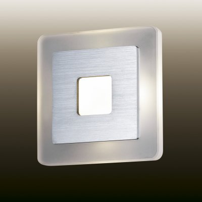 Настенный светильник odeon light 2724/4WL AMAFO Настенный светильник odeon light 2724/4WL AMAFOХай-тек<br><br><br>S освещ. до, м2: 0<br>Цветовая t, К: 4000<br>Тип лампы: LED - светодиодная<br>Тип цоколя: LED<br>Ширина, мм: 140<br>MAX мощность ламп, Вт: 4<br>Расстояние от стены, мм: 50<br>Высота, мм: 140<br>Цвет арматуры: серый