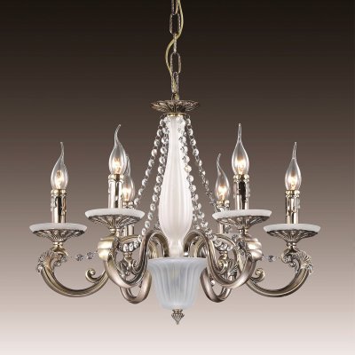 Люстра odeon light 2783/6 RONSA Люстра odeon light 2783/6 RONSAПодвесные<br>Подвесная люстра odeon light 2783/6 исполнена в чудесном мерцании каждой составляющей: начиная с дизайна завершая цветовым наполнением. Серебристая конструкция итальянского изделия состоит из нескольких декоративных элементов: лепных узоров, плавных переплетений, утончённых нитей из полупрозрачных камней. Отсутствие плафонов делает подвесную люстру odeon light 2783/6 незаезженной стандартами. Лампы в форме пламени свечи придают изделию особенный шарм и очарование, делая весь шедевр уникальным и стильным. Это и неудивительно, ведь перед Вами исключительный модерн: оригинальный, модный и изысканный одновременно. Подвесная люстра odeon light 2783/6 – свежий взгляд на грациозное освещение с любого ракурса!<br><br>Установка на натяжной потолок: Да<br>S освещ. до, м2: 16<br>Крепление: Крюк<br>Тип лампы: накаливания / энергосбережения / LED-светодиодная<br>Тип цоколя: E14<br>Количество ламп: 6<br>MAX мощность ламп, Вт: 40<br>Диаметр, мм мм: 570<br>Высота, мм: 465 - 1200<br>Цвет арматуры: бронзовый