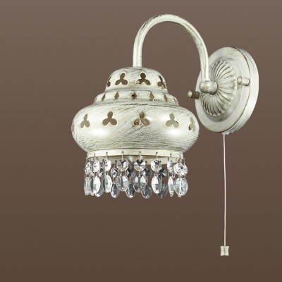 Светильник настенный бра Odeon light 2842/1W BAHAR Светильник настенный бра Odeon light 2842/1W BAHARКлассика<br>В данном разделе интернет-магазина Светодом Вы сможете купить для освещения дома грациозную модель - Бра 2842/1W серии Bahar оформлена в классическом стиле. Бра состоит из изящного металлического плафона с переплетенным рисунком, хрустальных подвесок и арматуры белого цвета с золотой патиной. Данная модель сможет превратить ваш интерьер в восточную сказку. Цоколь Е14. Мощность 1х40W. Нет ламп в комплекте.<br><br>Тип товара: Настенный светильник бра с выключателем<br>Скидка, %: 24<br>Тип лампы: Накаливания / энергосбережения / светодиодная<br>Тип цоколя: E14<br>Количество ламп: 1<br>Ширина, мм: 165<br>MAX мощность ламп, Вт: 40<br>Расстояние от стены, мм: 230<br>Высота, мм: 245<br>Оттенок (цвет): белый с золотой патиной<br>Цвет арматуры: белый с золотистой патиной