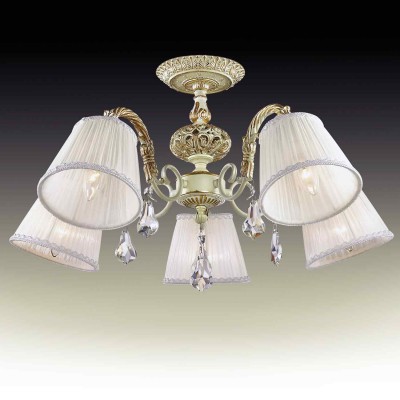 Люстра потолочная Odeon light 2882/5c NAVIS Люстра потолочная Odeon light 2882/5c NAVISПотолочные<br>В данном разделе интернет-магазина Светодом Вы сможете купить для освещения дома грациозную модель - Люстра 2882/5C серии Navis выполнена в классическом стиле. Потолочная люстра изготовлена из металла с кремовым покрытием и золотой патиной. Классичесский дизайн данной модели прекрасно подойдет к любому интерьеру и станет его незаменимым дополнением, плафоны выполнены из ткани, декорирована люстра хрустальными подвесками . Цоколь Е14. Мощность 5х40W. Нет ламп в комплекте.<br><br>Установка на натяжной потолок: Да<br>S освещ. до, м2: 10<br>Крепление: Планка<br>Тип лампы: Накаливания / энергосбережения / светодиодная<br>Тип цоколя: E14<br>Количество ламп: 5<br>MAX мощность ламп, Вт: 40<br>Диаметр, мм мм: 670<br>Высота, мм: 370<br>Оттенок (цвет): бежевый с золотой патиной<br>Цвет арматуры: бежевый с золотистой патиной
