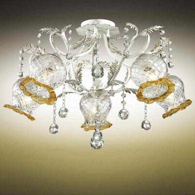 Люстра потолочная Odeon light 2883/5c TIMORA Люстра потолочная Odeon light 2883/5c TIMORAПотолочные<br>В данном разделе интернет-магазина Светодом Вы сможете купить для освещения дома грациозную модель - Люстра 2883/5С серии Timora выполнена в классическом стиле. Потолочная люстра изготовлена из металла с белым покрытием и золотой патиной. Классичесский дизайн данной модели прекрасно подойдет к любому интерьеру и станет его незаменимым дополнением, плафоны выполнены из стекла в сочитани двух цветов, прозрачного и янтарного, декорирована люстра хрустальными подвесками . Цоколь Е14. Мощность 5х60W. Нет ламп в комплекте.<br><br>Установка на натяжной потолок: Да<br>S освещ. до, м2: 15<br>Крепление: Планка<br>Тип лампы: Накаливания / энергосбережения / светодиодная<br>Тип цоколя: E14<br>Цвет арматуры: белый с золотистой патиной<br>Количество ламп: 5<br>Диаметр, мм мм: 540<br>Высота, мм: 380<br>Оттенок (цвет): белый с золотой патиной<br>MAX мощность ламп, Вт: 60