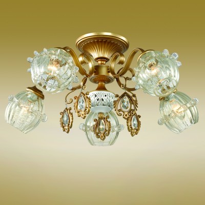 Люстра потолочная Odeon light 2887/5C FOLLA Люстра потолочная Odeon light 2887/5C FOLLAПотолочные<br>В данном разделе интернет-магазина Светодом Вы сможете купить для освещения дома грациозную модель - Люстра 2887/5С серии Folla оформлена в классическом стиле. Плафоны на потолочной люстре выполнены из прозрачного стекла с изящно переплетенным кантом по центру, хрустальных подвесок, необычно оформленных в декоративкую рамку, и арматуры цвета бронзы. Цоколь Е14. Мощность 5х60W. Нет ламп в комплекте.<br><br>Установка на натяжной потолок: Да<br>S освещ. до, м2: 15<br>Крепление: Планка<br>Тип товара: Люстра потолочная<br>Тип лампы: Накаливания / энергосбережения / светодиодная<br>Тип цоколя: E14<br>Количество ламп: 5<br>MAX мощность ламп, Вт: 60<br>Диаметр, мм мм: 670<br>Высота, мм: 290<br>Оттенок (цвет): бронзовый<br>Цвет арматуры: бронзовый