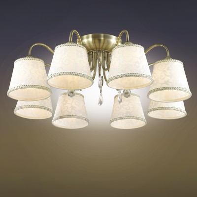 Люстра потолочная Odeon light 2915/8C SOLERA Люстра потолочная Odeon light 2915/8C SOLERAПотолочные<br>В данном разделе интернет-магазина Светодом Вы сможете купить для освещения дома грациозную модель - Люстра 2915/8С серии Solera выполнена в бронзовом цвете. Светлый тканевый абажур потолочной люстры украшен ажурным рисунком, декоративные элементы выполнены в виде хрустальных подвесок. Цоколь Е14. Мощность 8х40W. Нет ламп в комплекте.<br><br>Установка на натяжной потолок: Да<br>S освещ. до, м2: 16<br>Крепление: Планка<br>Тип лампы: Накаливания / энергосбережения / светодиодная<br>Тип цоколя: E14<br>Количество ламп: 8<br>MAX мощность ламп, Вт: 40<br>Диаметр, мм мм: 730<br>Высота, мм: 250<br>Оттенок (цвет): бронзовый<br>Цвет арматуры: бронзовый