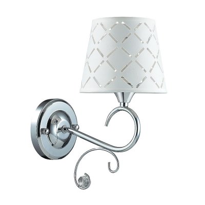 Настенный светильник бра Lumion 2997/1W FRITTA Настенный светильник бра Lumion 2997/1W FRITTAМодерн<br>Что нам известно о данной модели: Бра 2997/1W серии Fritta оформлена в современном стиле. Светильник состоит из тканевого белоснежного абажура с прорезями в виде ромбиков, и хромовой арматуры, украшенной хрустальными элементами. Сочетание классичности формы и актуальных цветовых решений делает эту модель подходящей для любого интерьера. Цоколь Е14. Мощность 1x40W. Нет ламп в комплекте.<br><br>Крепление: Настенное<br>Тип лампы: накаливания / энергосбережения / LED-светодиодная<br>Тип цоколя: E14<br>Количество ламп: 1<br>Ширина, мм: 140<br>MAX мощность ламп, Вт: 40<br>Диаметр, мм мм: 210<br>Длина, мм: 210<br>Высота, мм: 300<br>Цвет арматуры: серебристый