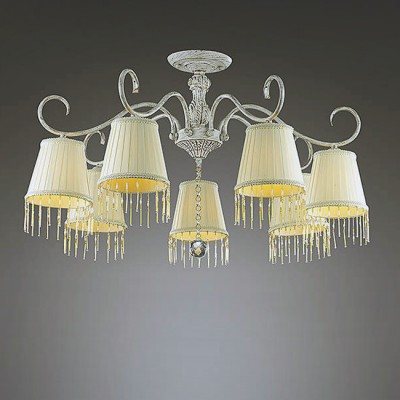 Светильник Lumion 3421/7C Светильник Lumion 3421/7CПотолочные<br>Элегантная и уютная серия в теплых кремовых тонах с плессированными абажурами, декорированными бусинами. Примечательна грациозным основанием в цвете слоновой кости с золотым патинированием. Светильник смотрится легко и воздушно еще благодаря потолочному креплению.<br><br>Установка на натяжной потолок: Да<br>S освещ. до, м2: 10<br>Крепление: Потолочное<br>Тип лампы: Накаливания / энергосбережения / светодиодная<br>Тип цоколя: E14<br>Количество ламп: 5<br>MAX мощность ламп, Вт: 40<br>Диаметр, мм мм: 770<br>Высота, мм: 430