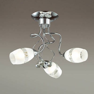 Светильник Lumion 3446/3C Светильник Lumion 3446/3CПотолочные<br>Серия Rozemunda - легкая, воздушная серия с витыми рожками в цвете хром, белыми матовыми плафонами с декором. Светильник изящно декорирован хрустальными элементами, прекрасно гармонирующими с обликом светильника.<br><br>Установка на натяжной потолок: Да<br>S освещ. до, м2: 9<br>Крепление: Потолочное<br>Тип лампы: Накаливания / энергосбережения / светодиодная<br>Тип цоколя: E14<br>Количество ламп: 3<br>Диаметр, мм мм: 560<br>Высота, мм: 300<br>MAX мощность ламп, Вт: 60