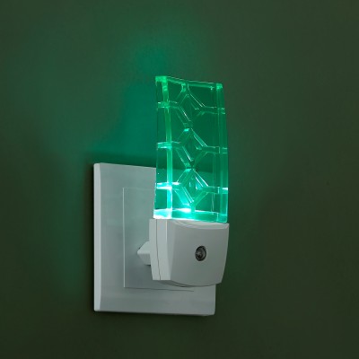 Novotech NIGHT LIGHT 357330 Светильник ночник Novotech NIGHT LIGHT 357330 Светильник ночникНочники<br>Светильник-ночник (в розетку) светодиодный с датчиком света модели Novotech 357330 из серии NIGHT LIGHT отличается следующим качеством: Корпус светильника сделан из пластика ПК. Преимуществами данного материала являются: 1. Химическая инертность – материал устойчив к воздействию кислот и щелочей, продуктов нефтепереработки; 2. Устойчивость к воздействию влаги; 3. Ударопрочность; 4. Долговечность; 5. Ровная поверхность Датчик света (датчик освещённости) – свет включается при наступлении темноты и недостаточном освещении.<br><br>Тип лампы: LED<br>Тип цоколя: LED<br>Цвет арматуры: белый<br>Ширина, мм: 50<br>Расстояние от стены, мм: 44<br>Высота, мм: 120<br>MAX мощность ламп, Вт: 0,5