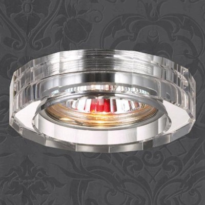 Novotech GLASS 369487 Встраиваемый светильник Novotech GLASS 369487 Встраиваемый светильникКруглые<br>Декоративный встраиваемый светильник модели Novotech 369487 из серии GLASS отличается следующим качеством: Основание светильника - алюминиевое литьё. Это сплав, основными достоинствами которого являются — устойчивость к практически всем видам негативного воздействия окружающей среды, коррозии, небольшой вес, по сравнению с другими видами металла и экологическая безопасность материала. Декоративный плафон произведен из хрусталя. Он обладает высоким показателем плотности, прозрачности и блеска. Благодаря содержанию свинца (не менее 30%) и определённому подбору углов, образуемых гранями, изделия из хрусталя отличаются необыкновенно яркой, многоцветной игрой света, чарующей магией красоты, совершенства и роскоши.<br><br>S освещ. до, м2: 2<br>Тип лампы: галогенная<br>Тип цоколя: GU5.3 (MR16)<br>MAX мощность ламп, Вт: 50<br>Диаметр, мм мм: 80<br>Диаметр врезного отверстия, мм: 65<br>Высота, мм: 35<br>Цвет арматуры: серебристый