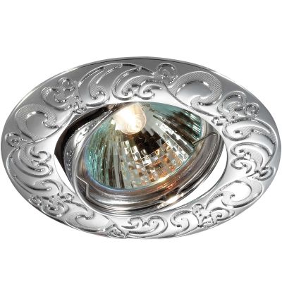 Novotech HENNA 369642 Точечный встраиваемый светильник Novotech HENNA 369642 Точечный встраиваемый светильникКруглые<br>Стандартный встраиваемый поворотный светильник модели Novotech 369642 из серии HENNA отличается следующим качеством: Светильник сделан из алюминиевого литья. Это сплав, основными достоинствами которого являются — устойчивость к практически всем видам негативного воздействия окружающей среды, коррозии, небольшой вес, по сравнению с другими видами металла и экологическая безопасность материала. Простота монтажа. Экономичность. Надёжность. Большой срок службы. Возможность реализации оригинальных дизайнерских решений за счет гибкости и небольшой толщины. !!!Предупреждение: Ленту запрещается резать, чтобы не нарушать герметичность конструкции. В комплект не входит элемент питания.<br><br>S освещ. до, м2: 2<br>Тип товара: Точечный встраиваемый светильник<br>Тип лампы: галогенная<br>Тип цоколя: GU5.3 (MR16)<br>MAX мощность ламп, Вт: 50<br>Диаметр, мм мм: 92<br>Диаметр врезного отверстия, мм: 82<br>Расстояние от стены, мм: 5<br>Высота, мм: 25<br>Цвет арматуры: серебристый