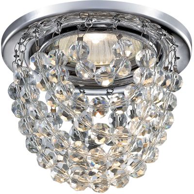 Novotech JINNI 369778 Встраиваемый светильник Novotech JINNI 369778 Встраиваемый светильникХрустальные<br>Декоративный встраиваемый светильник модели Novotech 369778 из серии JINNI отличается следующим качеством: Основание светильника сделано из металла. Это популярный и востребованный материал благодаря ряду качеств. К ним относится: повышенная прочность, износостойкость и долговечность. Подвески изготовлены из хрусталя. Он обладает высоким показателем плотности, прозрачности и блеска. Благодаря содержанию свинца (не менее 30%) и определённому подбору углов, образуемых гранями, изделия из хрусталя отличаются необыкновенно яркой, многоцветной игрой света, чарующей магией красоты, совершенства и роскоши. А так же, он обладают красивым звоном.<br><br>S освещ. до, м2: 2<br>Тип лампы: галогенная<br>Тип цоколя: GU5.3 (MR16)<br>MAX мощность ламп, Вт: 50<br>Диаметр, мм мм: 90<br>Диаметр врезного отверстия, мм: 70<br>Расстояние от стены, мм: 59<br>Высота, мм: 83<br>Цвет арматуры: серебристый