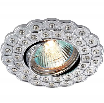 Novotech FLOWER 369822 Точечный встраиваемый светильник Novotech FLOWER 369822 Точечный встраиваемый светильникКруглые<br>Стандартный встраиваемый поворотный светильник модели Novotech 369822 из серии FLOWER отличается следующим качеством: Светильник сделан из алюминиевого литья. Это сплав, основными достоинствами которого являются — устойчивость к практически всем видам негативного воздействия окружающей среды, коррозии, небольшой вес, по сравнению с другими видами металла и экологическая безопасность материала. Декоративные стразы произведены из хрусталя. Он обладает высоким показателем плотности, прозрачности и блеска. Благодаря содержанию свинца (не менее 30%) и определённому подбору углов, образуемых гранями, изделия из хрусталя отличаются необыкновенно яркой, многоцветной игрой света, чарующей магией красоты, совершенства и роскоши.<br><br>S освещ. до, м2: 2<br>Тип лампы: галогенная<br>Тип цоколя: GU5.3 (MR16)<br>MAX мощность ламп, Вт: 50<br>Диаметр, мм мм: 100<br>Диаметр врезного отверстия, мм: 78<br>Расстояние от стены, мм: 5<br>Высота, мм: 25<br>Цвет арматуры: серебристый