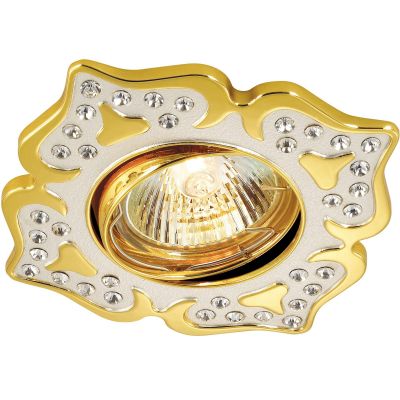 Novotech FLOWER 369825 Точечный встраиваемый светильник Novotech FLOWER 369825 Точечный встраиваемый светильникДекоративные<br>Стандартный встраиваемый поворотный светильник модели Novotech 369825 из серии FLOWER отличается следующим качеством: Светильник сделан из алюминиевого литья. Это сплав, основными достоинствами которого являются — устойчивость к практически всем видам негативного воздействия окружающей среды, коррозии, небольшой вес, по сравнению с другими видами металла и экологическая безопасность материала. Декоративные стразы произведены из хрусталя. Он обладает высоким показателем плотности, прозрачности и блеска. Благодаря содержанию свинца (не менее 30%) и определённому подбору углов, образуемых гранями, изделия из хрусталя отличаются необыкновенно яркой, многоцветной игрой света, чарующей магией красоты, совершенства и роскоши.<br><br>S освещ. до, м2: 2<br>Тип лампы: галогенная<br>Тип цоколя: GU5.3 (MR16)<br>Ширина, мм: 103<br>MAX мощность ламп, Вт: 50<br>Диаметр врезного отверстия, мм: 78<br>Длина, мм: 103<br>Расстояние от стены, мм: 5<br>Высота, мм: 25<br>Оттенок (цвет): золото<br>Цвет арматуры: серебристый