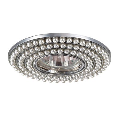 Novotech PEARL 370141 Встраиваемый светильник Novotech PEARL 370141 Встраиваемый светильникКруглые<br>Декоративный встраиваемый светильник модели Novotech 370141 из серии PEARL отличается следующим качеством: Корпус светильника состоит из сплава цинка. Благодаря сравнительно высоким механическим и литейным качествам, изделия, выполненные из сплава цинка, отличаются высокой точностью деталей декора со сложной конфигурацией. Так же он обладает антикоррозийными свойствами. Отделка - искусственный жемчуг. Он отличается ярким блеском и идеальной формой бусин, по своей красоте не уступая настоящему и при электрическом освещении дает красивый эффект преломления света.<br><br>S освещ. до, м2: 3<br>Тип лампы: галогенная/LED<br>Тип цоколя: GU5.3 (MR16)<br>Цвет арматуры: серебристый<br>Количество ламп: 1<br>Диаметр, мм мм: 115<br>Диаметр врезного отверстия, мм: 75<br>Высота, мм: 10<br>MAX мощность ламп, Вт: 50