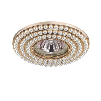 Novotech PEARL 370142 Встраиваемый светильник Novotech PEARL 370142 Встраиваемый светильникКруглые<br>Декоративный встраиваемый светильник модели Novotech 370142 из серии PEARL отличается следующим качеством: Корпус светильника состоит из сплава цинка. Благодаря сравнительно высоким механическим и литейным качествам, изделия, выполненные из сплава цинка, отличаются высокой точностью деталей декора со сложной конфигурацией. Так же он обладает антикоррозийными свойствами. Отделка - искусственный жемчуг. Он отличается ярким блеском и идеальной формой бусин, по своей красоте не уступая настоящему и при электрическом освещении дает красивый эффект преломления света.<br><br>S освещ. до, м2: 3<br>Тип лампы: галогенная/LED<br>Тип цоколя: GU5.3 (MR16)<br>Количество ламп: 1<br>MAX мощность ламп, Вт: 50<br>Диаметр, мм мм: 115<br>Диаметр врезного отверстия, мм: 75<br>Высота, мм: 10<br>Цвет арматуры: Золотой