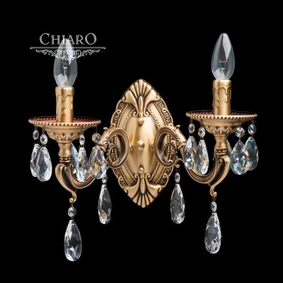 Светильник настенный бра Chiaro 411021902 Паула Светильник настенный бра Chiaro 411021902 ПаулаКлассика<br>Описание модели 411021902: Завораживающая своей ослепительной красотой люстра из коллекции Паула может стать завершающим аккордом интерьера в стиле барокко. Основание из благородной латуни, продуманные до мельчайших подробностей отточенные детали – всё напоминает о пышном убранстве средневековых дворцов. Изящные, округлые линии, тонкие завитки, прозрачные хрустальные камни и сказочная игра света говорят о том, что эта роскошная люстра предназначена для истинных гурманов<br><br>S освещ. до, м2: 6<br>Тип лампы: Накаливания / энергосбережения / светодиодная<br>Тип цоколя: E14<br>Количество ламп: 2<br>Ширина, мм: 340<br>MAX мощность ламп, Вт: 60<br>Длина, мм: 380<br>Высота, мм: 240<br>Поверхность арматуры: матовый<br>Цвет арматуры: бронзовый<br>Общая мощность, Вт: 120