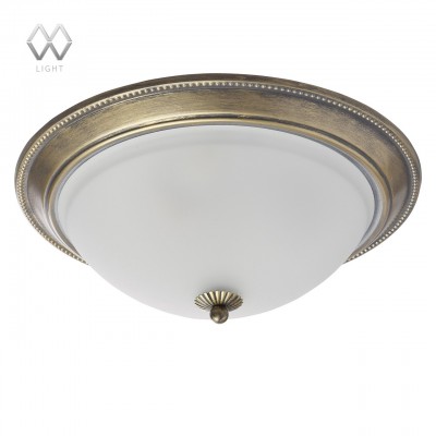 Люстра Mw light 450015503 Ариадна Люстра Mw light 450015503 АриаднаПотолочные<br>Описание модели 450015503: Элегантная люстра из коллекции «Ариадна» станет прекрасным дополнением классического интерьера гостиной или спальной комнаты. Основание античного бронзового цвета дополнено патинированием в цвет кофе, благодаря чему светильник смотрится особенно эффектно. Необычный оттенок удачно сочетается с чашей-плафоном из матированного стекла.<br><br>Установка на натяжной потолок: Ограничено<br>S освещ. до, м2: 9<br>Крепление: Планка<br>Тип лампы: Накаливания / энергосбережения / светодиодная<br>Тип цоколя: E27<br>Количество ламп: 3<br>MAX мощность ламп, Вт: 60<br>Диаметр, мм мм: 380<br>Высота, мм: 130<br>Цвет арматуры: бронзовый с чернением