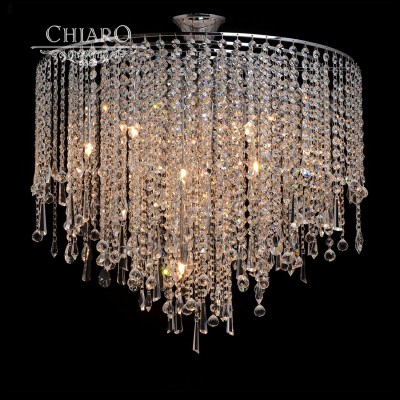 Люстра Chiaro 464016210 Бриз Люстра Chiaro 464016210 БризКаскадные<br>Восхитительное сияние демонстрирует нам потолочный светильник из коллекции Бриз! Люстра с таким роскошным декором подойдёт для интерьерного пространства в стилях ар-деко, неоклассика, эклектика или фьюжен. Облегчённое металлическое основание цвета хрома округлое в диаметре, служит основой для крепления хрустальных подвесок, расположенных каскадами. В блистающем от ярких световых переливов светильнике из коллекции Бриз используется хрусталь 4-х видов огранки! Люстра снабжена галогеновыми лампочками с цоколем G9 и имеет хорошие параметры освещённости пространства до 20 кв.м<br><br>Установка на натяжной потолок: Да<br>S освещ. до, м2: 20<br>Крепление: Крюк<br>Тип лампы: Галогеновая<br>Тип цоколя: G9<br>Количество ламп: 10<br>MAX мощность ламп, Вт: 40<br>Диаметр, мм мм: 600<br>Высота, мм: 670<br>Поверхность арматуры: глянцевый<br>Цвет арматуры: серебристый<br>Общая мощность, Вт: 400