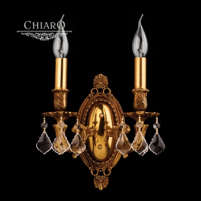 Светильник настенный бра Chiaro 491020602 Габриэль Светильник настенный бра Chiaro 491020602 ГабриэльХрустальные<br>Металлическое основание цвета червлёного золото, декоративные подвески из прозрачного хрусталя. делают модель светильника Chiaro 491020602 Габриэль еще более достойной и неповторимой, что позволяет вписать изделие практически в любой задуманный вами интерьер! Купите уже сегодня превосходную модель светильника Chiaro 491020602 Габриэль производства Германия в интернет-магазине светодом и почувствуйте уют и комфорт в Вашем доме. Мы доставим покупку бесплатно по Вашему городу в ближайшее время. Подробная информация о доставке в соответствующем разделе Доставка или по телефону.<br><br>S освещ. до, м2: 4<br>Тип лампы: накаливания / энергосбережения / LED-светодиодная<br>Тип цоколя: E14<br>Количество ламп: 2<br>Ширина, мм: 260<br>MAX мощность ламп, Вт: 40<br>Длина, мм: 280<br>Высота, мм: 150