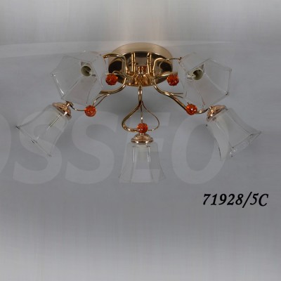 Светильник Colosseo 71928/5C optima Светильник Colosseo 71928/5C optimaПотолочные<br>Компания «Светодом» предлагает широкий ассортимент люстр от известных производителей. Представленные в нашем каталоге товары выполнены из современных материалов и обладают отличным качеством. Благодаря широкому ассортименту Вы сможете найти у нас люстру под любой интерьер. Мы предлагаем как классические варианты, так и современные модели, отличающиеся лаконичностью и простотой форм. Стильная люстра Colosseo 71928/5C станет украшением любого дома. Эта модель от известного производителя не оставит равнодушным ценителей красивых и оригинальных предметов интерьера. Люстра Colosseo 71928/5C обеспечит равномерное распределение света по всей комнате. При выборе обратите внимание на характеристики, позволяющие приобрести наиболее подходящую модель. Купить понравившуюся люстру по доступной цене Вы можете в интернет-магазине «Светодом». Мы предлагаем доставку не только по Москве и Екатеринбурге, но и по всей России.<br><br>S освещ. до, м2: 15<br>Тип товара: Люстра потолочная<br>Скидка, %: 26<br>Тип цоколя: E14<br>Количество ламп: 5<br>Ширина, мм: 580<br>MAX мощность ламп, Вт: 40<br>Диаметр, мм мм: 580<br>Длина, мм: 580<br>Высота, мм: 230<br>Цвет арматуры: золотой, прозрачный хрусталь