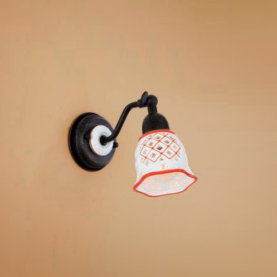 Citilux CL534513 Светильник настенный бра Citilux CL534513 Светильник настенный браРустика<br><br><br>S освещ. до, м2: 4<br>Тип лампы: накаливания / энергосбережения / LED-светодиодная<br>Тип цоколя: E14<br>Количество ламп: 1<br>Ширина, мм: 95<br>MAX мощность ламп, Вт: 60<br>Размеры: Ширина 9,5см, Высота 14см, Глубина 17см, Размер головки 14см, Ажурный керамическиий плафон с ручной росписью<br>Расстояние от стены, мм: 170<br>Высота, мм: 140<br>Поверхность арматуры: матовый<br>Цвет арматуры: черный