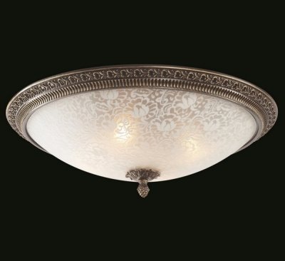 Люстра Maytoni CL908-04-R Geometry 6 Люстра Maytoni CL908-04-R Geometry 6Потолочные<br>Компания Maytoni занимается производством высококачественных изделий по разумным ценам. Люстра потолочная Maytoni Geometry 6 CL908-04-R понравится Вам необычным дизайном, сочетанием цветов и декором. На фото можно рассмотреть всю элегантность основания цвета темной бронзы и легкость и изящество плафона, изготовленного из белого полуматового стекла и украшенного причудливыми узорами. Люстра потолочного крепления монтируется на потолок с помощью монтажной пластины и рассчитана на использование четырех лампочек мощностью 40 Ватт. Стоимость изделий компании Майтони позволяет купить их практически любому покупателю.<br><br>Установка на натяжной потолок: Ограничено<br>S освещ. до, м2: 10<br>Крепление: Планка<br>Тип лампы: накаливания / энергосбережения / LED-светодиодная<br>Тип цоколя: E14<br>Количество ламп: 4<br>MAX мощность ламп, Вт: 40<br>Диаметр, мм мм: 470<br>Высота, мм: 160<br>Цвет арматуры: бронзовый