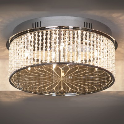 Люстра Lussole Lsa-5207-09 Люстра Lussole Lsa-5207-09Потолочные<br>Потолочная люстра Lussole Lsa-5207-09 - великолепный экземпляр итальянского мастерства, в котором традиционная, передающаяся из поколения в поколение обработка хрусталя, неповторимая красота и тщательная проработка каждой детали идеально сочетается с современными технологиями и международными стандартами качества! Конструкция выполнена таким образом, что все девять ламп «упакованы» в круглую форму, «прошитую» сверкающими «нитями». Лучи, попадая на хрусталь, отражаются во множестве граней и создают уникальное, «искристое» освещение. Светильник идеально впишется в Ваш интерьер, внесет в него роскошный, «праздничный» облик и неповторимую красоту!<br><br>Установка на натяжной потолок: Ограничено<br>S освещ. до, м2: 11<br>Крепление: Планка<br>Тип лампы: галогенная / LED-светодиодная<br>Тип цоколя: G4<br>Количество ламп: 9<br>Ширина, мм: 400мм<br>MAX мощность ламп, Вт: 20<br>Диаметр, мм мм: 400мм<br>Высота, мм: 180мм<br>Цвет арматуры: серебристый