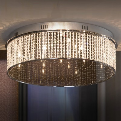 Люстра Lussole Lsa-5207-14 Люстра Lussole Lsa-5207-14Потолочные<br>Итальянский потолочный светильник Lussole Lsa-5207-14 станет настоящим украшением Вашего интерьера и любимым предметом в доме! В круглой «компактной» форме, выполненной из хрустальных подвесок, «спрятаны» четырнадцать галогенных лампочек. Лучи, попадая на хрусталь, отражаются во множестве граней и создают уникальное, «искристое» освещение на площади до 18 кв.м. Такая люстра должна сверкать только в больших, «парадных» помещениях, предназначенных для приема множества гостей – залах, гостиных, холлах. Она будет создавать праздничную яркую атмосферу и всегда дарить прекрасное настроение!<br><br>Установка на натяжной потолок: Ограничено<br>S освещ. до, м2: 18<br>Крепление: Планка<br>Тип лампы: галогенная / LED-светодиодная<br>Тип цоколя: G4<br>Количество ламп: 14<br>Ширина, мм: 620мм<br>MAX мощность ламп, Вт: 20<br>Диаметр, мм мм: 620мм<br>Высота, мм: 219мм<br>Цвет арматуры: серебристый