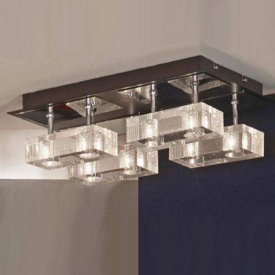 Люстра Lussole LSF-1307-08 Notte Di Luna хром Люстра Lussole LSF-1307-08 Notte Di Luna хромПотолочные<br>Оригинальная люстра LUSSOLE LSF-1307-08 NOTTE DI LUNA выполнена в современном дизайне – восемь лампочек размещены в четыре прямоугольные секции, перекликающиеся формой с креплением. Проходя сквозь прозрачные кристаллы, свет получается ярким и направленным. Люстра идеально подойдет для установки в большом помещении, так как лампочки освещают пространство на расстоянии до двадцати двух квадратных метров!<br><br>Установка на натяжной потолок: Ограничено<br>S освещ. до, м2: 18<br>Крепление: Планка<br>Тип лампы: галогенная / LED-светодиодная<br>Тип цоколя: G9<br>Количество ламп: 8<br>Ширина, мм: 290<br>MAX мощность ламп, Вт: 40<br>Длина, мм: 490<br>Высота, мм: 150<br>Оттенок (цвет): белый<br>Цвет арматуры: серебристый