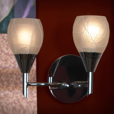 Светильник Lussole lsf-1801-02 Светильник Lussole lsf-1801-02Тиффани<br>В интернет-магазине «Светодом» представлен широкий выбор настенных бра по привлекательной цене. Это качественные товары от популярных мировых производителей. Благодаря большому ассортименту Вы обязательно подберете под свой интерьер наиболее подходящий вариант. Оригинальное настенное бра Lussole LSF-1801-02 можно использовать для освещения не только гостиной, но и прихожей или спальни. Модель выполнена из современных материалов, поэтому прослужит на протяжении долгого времени. Обратите внимание на технические характеристики, чтобы сделать правильный выбор. Чтобы купить настенное бра Lussole LSF-1801-02 в нашем интернет-магазине, воспользуйтесь «Корзиной» или позвоните менеджерам компании «Светодом» по указанным на сайте номерам. Мы доставляем заказы по Москве, Екатеринбургу и другим российским городам.<br><br>S освещ. до, м2: 6<br>Тип лампы: накаливания / энергосбережения / LED-светодиодная<br>Тип цоколя: E14<br>Количество ламп: 2<br>Ширина, мм: 150<br>MAX мощность ламп, Вт: 40<br>Длина, мм: 270<br>Высота, мм: 200<br>Цвет арматуры: серебристый