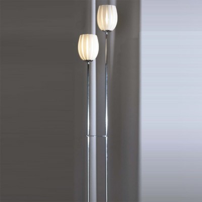 Торшер Lussole LSF-6705-02 Brindnsi Торшер Lussole LSF-6705-02 BrindnsiДекоративные<br>Торшер Lussole LSF-6705-02 прекрасен в своей лаконичной манерности! Мало того, что удобство его определено возможностью переноса изделия в необходимые зоны сияния, так к тому же светильник выполнен в деликатном стиле модерн: лёгком, искусном и модном. Утончённый силуэт хромированной конструкции торшера Lussole LSF-6705-02 позволит украсить любое пространство, насыщая его благородством формы и содержания. Аккуратный белоснежный плафон изящной геометрии смягчит помещение, а нанесённый своеобразный узор станет частью восхитительного декора Вашего безупречного интерьера. Шарм и лаконичное изящество присущи торшеру Lussole LSF-6705-02: модному, стильному и яркому в своём свечении!<br><br>S освещ. до, м2: 6<br>Тип товара: Тошер напольный<br>Тип лампы: накаливания / энергосбережения / LED-светодиодная<br>Тип цоколя: E14<br>Количество ламп: 2<br>Ширина, мм: 130<br>MAX мощность ламп, Вт: 40<br>Длина, мм: 260<br>Высота, мм: 1420<br>Оттенок (цвет): белый<br>Цвет арматуры: серебристый