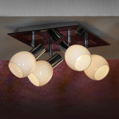 Светильник Lussole LSX-5507-04 Светильник Lussole LSX-5507-04Потолочные<br>Компания «Светодом» предлагает широкий ассортимент люстр от известных производителей. Представленные в нашем каталоге товары выполнены из современных материалов и обладают отличным качеством. Благодаря широкому ассортименту Вы сможете найти у нас люстру под любой интерьер. Мы предлагаем как классические варианты, так и современные модели, отличающиеся лаконичностью и простотой форм. Стильная люстра Flamelli FL3108-6C станет украшением любого дома. Эта модель от известного производителя не оставит равнодушным ценителей красивых и оригинальных предметов интерьера. Люстра Flamelli FL3108-6C обеспечит равномерное распределение света по всей комнате. При выборе обратите внимание на характеристики, позволяющие приобрести наиболее подходящую модель. Купить понравившуюся люстру по доступной цене Вы можете в интернет-магазине «Светодом».<br><br>Установка на натяжной потолок: Ограничено<br>S освещ. до, м2: 8<br>Крепление: Планка<br>Тип лампы: Накаливания / энергосбережения / светодиодная<br>Тип цоколя: E14<br>Количество ламп: 4<br>Ширина, мм: 290<br>MAX мощность ламп, Вт: 40<br>Длина, мм: 290<br>Высота, мм: 180<br>Цвет арматуры: серебристый