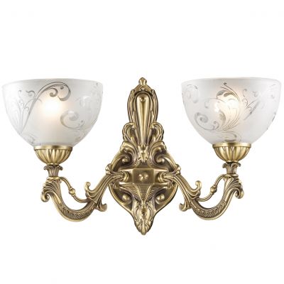 Светильник Odeon light 2563/2W Светильник Odeon light 2563/2WКлассические<br>Изысканно рассеиваемый источник уютного света – это бра Odeon Light с двумя изящными плафонами и красивыми изгибами бронзового сияния. Представьте отдельный благородный уголок с атмосферой уединения и спокойствия, где вы можете насладиться своими мыслями, выпить чашечку горячего чая, проникнуть в любимую книгу. Прекрасным тандемом в дизайне интерьера будет использование бра Odeon Light с обоями и фурнитурой тёплых цветов: шоколадные, бордовые, бежевые и другие.<br><br>S освещ. до, м2: 8<br>Крепление: настенное<br>Тип лампы: накаливания / энергосбережения / LED-светодиодная<br>Тип цоколя: E27<br>Цвет арматуры: бронзовый<br>Количество ламп: 2<br>Ширина, мм: 410<br>Расстояние от стены, мм: 230<br>Высота, мм: 250<br>Оттенок (цвет): белый<br>MAX мощность ламп, Вт: 60