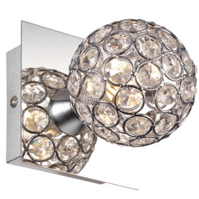 Светильник Odeon light 2576/1W Светильник Odeon light 2576/1WХрустальные<br>Хрустальное бра Odeon light 2576/1W – аккуратный шедевр итальянских дизайнеров! Сверкающее великолепие изящной конструкции позволит оригинально украсить отдельные зоны уединения в Вашем домашнем пространстве. Каждый ценитель хрустальной эстетики обратит внимание на лаконичную форму светового круга, украшенного блестящими гранулами переливающегося блеска. Зеркальные элементы придают настенному бра Odeon light 2576/1W оригинальность и исключительный шарм, которыми Вы сможете наслаждаться каждый день. Современно, стильно и по-настоящему благородно! То, что выбирают ценители оригинальной хрустальной эстетики. Сделайте себе настоящий подарок света в восхитительном исполнении!<br><br>S освещ. до, м2: 2<br>Крепление: настенное<br>Тип лампы: галогенная / LED-светодиодная<br>Тип цоколя: G9<br>Количество ламп: 1<br>Ширина, мм: 100<br>MAX мощность ламп, Вт: 40<br>Расстояние от стены, мм: 140<br>Высота, мм: 100<br>Оттенок (цвет): белый<br>Цвет арматуры: серебристый