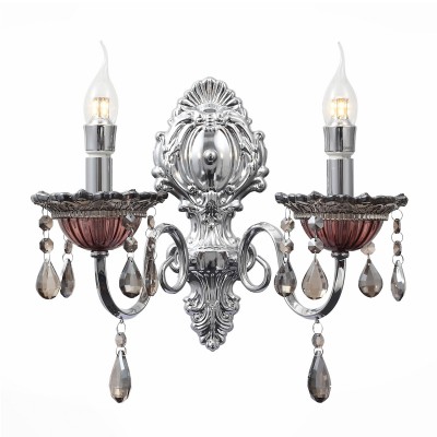 Светильник St Luce SL139.101.02 Светильник St Luce SL139.101.02Классические<br>Если Вы настроены купить светильник модели SL13910102, то обратите внимание: Люстры коллекции Rapimento прекрасно впишутся в современный классический интерьер зала, кабинета, спальни, придадут обстановке роскошь и аристократичность. В этих моделях дизайнеры умело воплотили сочетание классических форм и современных материалов. Хромированные металлические основания люстр украшаютстеклянные чаши из бордового стекла и подвесы из хрусталя цвета коньяка. Великолепные в своем цветовом воплощении, модели привлекают своей красотой и элегантностью.<br>