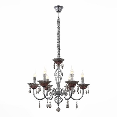 Светильник St Luce SL139.103.06 Светильник St Luce SL139.103.06Подвесные<br>Если Вы настроены купить светильник модели SL13910306, то обратите внимание: Люстры коллекции Rapimento прекрасно впишутся в современный классический интерьер зала, кабинета, спальни, придадут обстановке роскошь и аристократичность. В этих моделях дизайнеры умело воплотили сочетание классических форм и современных материалов. Хромированные металлические основания люстр украшаютстеклянные чаши из бордового стекла и подвесы из хрусталя цвета коньяка. Великолепные в своем цветовом воплощении, модели привлекают своей красотой и элегантностью.<br><br>Установка на натяжной потолок: Да<br>S освещ. до, м2: 12<br>Тип лампы: Накаливания / энергосбережения / светодиодная<br>Тип цоколя: E14<br>Количество ламп: 6<br>MAX мощность ламп, Вт: 40<br>Диаметр, мм мм: 529<br>Высота, мм: 627 - 1200