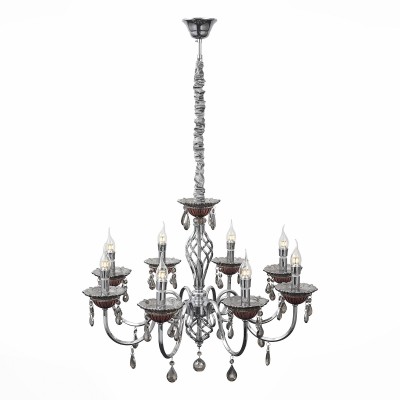Светильник St Luce SL139.103.08 Светильник St Luce SL139.103.08Подвесные<br>Если Вы настроены купить светильник модели SL13910308, то обратите внимание: Люстры коллекции Rapimento прекрасно впишутся в современный классический интерьер зала, кабинета, спальни, придадут обстановке роскошь и аристократичность. В этих моделях дизайнеры умело воплотили сочетание классических форм и современных материалов. Хромированные металлические основания люстр украшаютстеклянные чаши из бордового стекла и подвесы из хрусталя цвета коньяка. Великолепные в своем цветовом воплощении, модели привлекают своей красотой и элегантностью.<br><br>Установка на натяжной потолок: Да<br>S освещ. до, м2: 16<br>Тип лампы: Накаливания / энергосбережения / светодиодная<br>Тип цоколя: E14<br>Количество ламп: 8<br>MAX мощность ламп, Вт: 40<br>Диаметр, мм мм: 760<br>Высота, мм: 747 - 1200